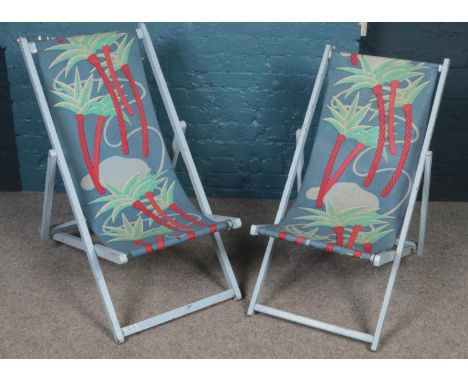 Two vintage folding deck chairs.  