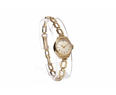 LADY'S ROTARY NINE CARAT GOLD MANUAL WIND WRIST WATCHthe round dial with applied Arabic numerals, on a nine carat gold bracel