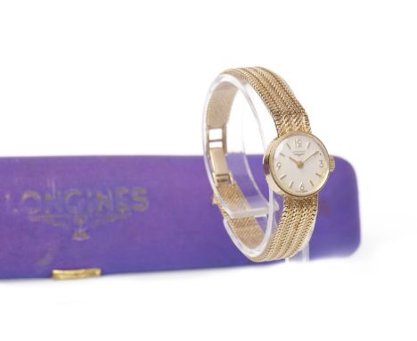 LADY'S LONGINES NINE CARAT GOLD MANUAL WIND WRIST WATCHthe round cream dial with applied baton and Arabic hour markers, 17mm 