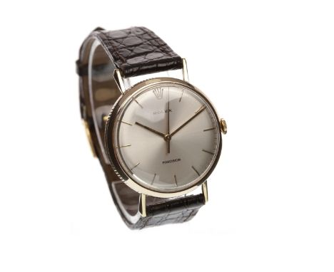 GENTLEMAN'S ROLEX PRECISION EIGHTEEN CARAT GOLD MANUAL WIND WRIST WATCH1950s, the round dial with applied gold coloured baton