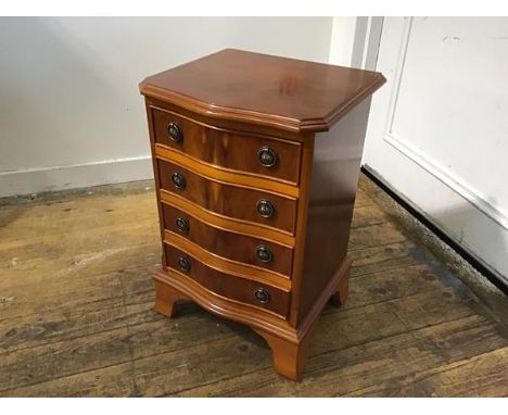 A yew wood miniature serpentine chest, the top with moulded edge above four long drawers, on bracket feet (h.61cm x 41cm x 34