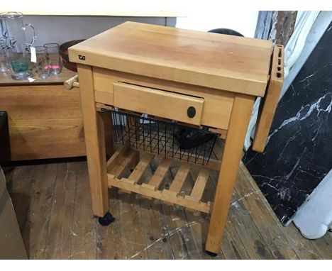 A T.E. Servus oiled beach wood kitchen chopping block, complete with knife section, slide out drawer, rail and basket, united