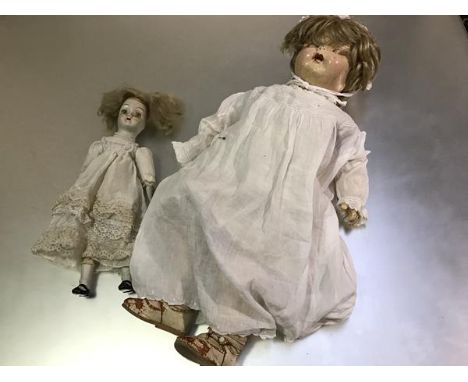 A 19thc style bisque head doll with china feet and hands etc. and painted face and a composition head doll, with composition 