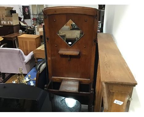 An oak 1930s mirror panel back hallstand with shelf and lift up glove box (h.184cm x 72cm x 30cm)