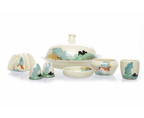 CLARICE CLIFF COMPOSITE TETE A TETE SERVICE IN NEWLYN PATTERNc. 1930s, hand painted under glaze, honeyglaze, of ridged form, 