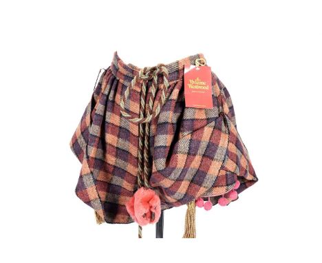 A pair of 1990s Vivienne Westwood tartan wool culottes, red label, with pink pom-pom fringing, goldwork tassels, oversized co