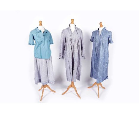 1970s Laura Ashley floral ensembles, comprising: a blue brushed cotton smock dress, with high collar and long sleeves, UK siz
