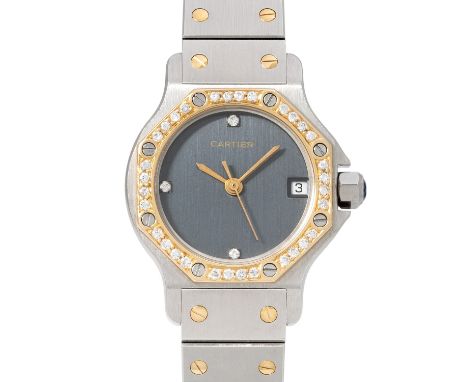 CARTIER Santos Octagon Ref 187903 Damenuhr. Box und Papiere. Edelstahl / 18K Gelbgold. Quarzwerk in funktionsfähigem Zustand.