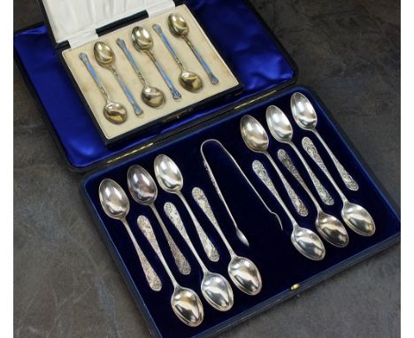 An Edwardian cased set of twelve silver teaspoons with a pair of sugar tongs, James Dixon & Sons Ltd, Sheffield 1902, each wi