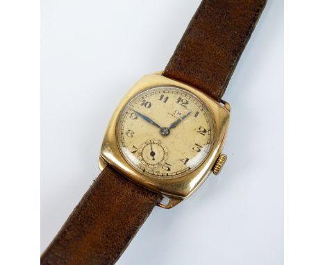 A Gentleman's 9ct gold Omega wristwatch, the cushion shaped silvered dial with black Arabic numerals and subsidiary seconds d