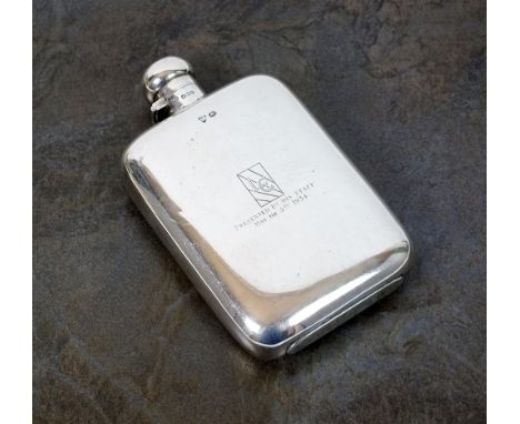 A silver presentation hip flask, G & J W Hawksley, Sheffield 1929, the plain polished body with engraved monogram and inscrip