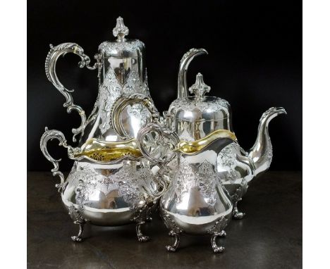 A Victorian four piece silver tea and coffee service, Robert Hennell III, London 1857-1860, each piece of baluster form with 