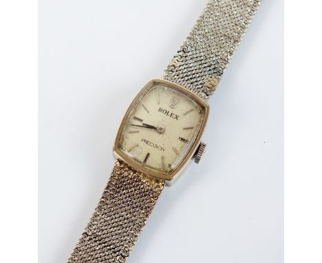 A lady's 9ct white gold Rolex Precision bracelet watch, the oblong dial with batons, manual wind, with integral 9ct white gol