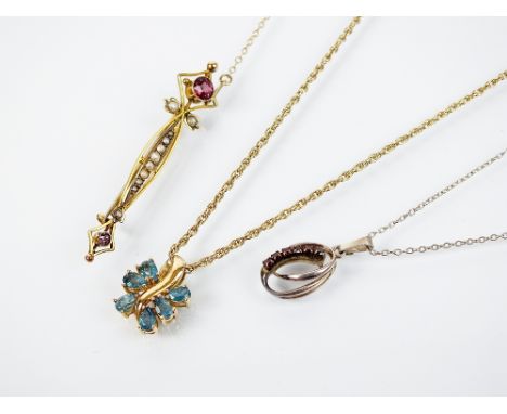 A 14ct gold six stone blue topaz pendant, suspended on 9ct gold rope twist chain, together with an early 20th garnet and spli