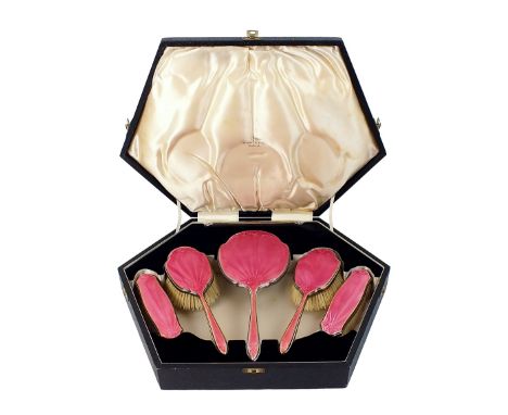 A cased silver mounted and pink guilloche enamel dressing table set, Walker & Hall, Sheffield 1938, comprising; hand mirror, 