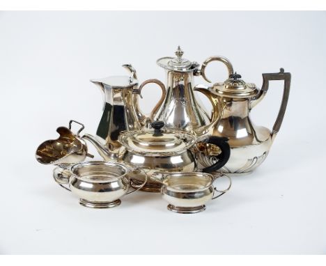 A three piece silver tea service, Mappin & Webb, Birmingham 1928, each piece of oval form with decorative rim, comprising; te