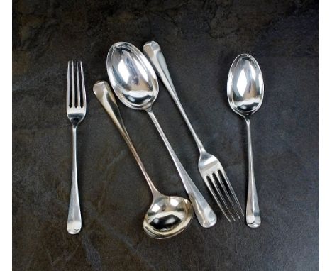 A part canteen of George V Hanoverian and rat tail pattern silver flatware, Joseph Rogers & Sons, Birmingham 1925, comprising