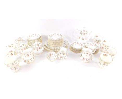 A Royal Albert porcelain tea and coffee service decorated in the Winsome pattern, comprising pair of bread plates, pair of ca