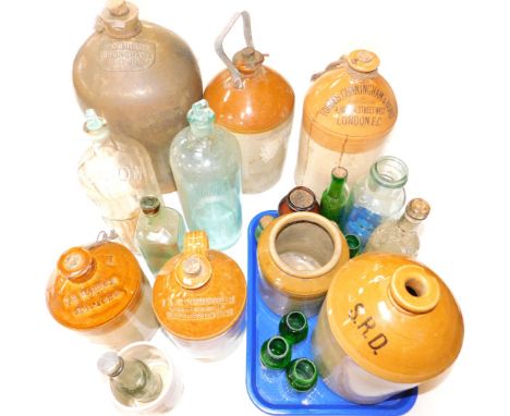 A Victorian stoneware and glass medicinal and alcohol jars and bottles, including a glass poison jar, and stoneware jars for 