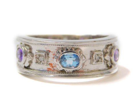 A 9ct white gold dress ring, set with tiny diamonds, amethyst and aquamarine, in modern setting, size Q/R, 5.8g all in.