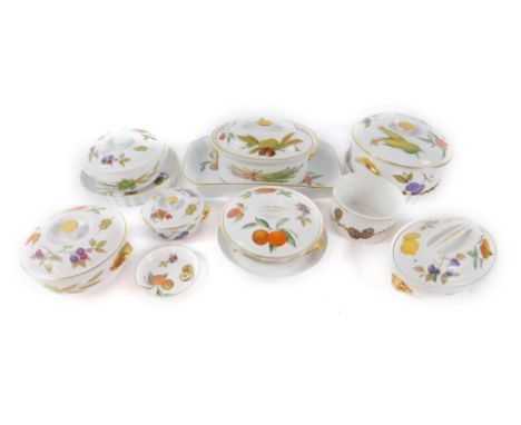A group of Royal Worcester oven to tableware decorated in the Evesham pattern, including tureens and covers, flan dishes, and