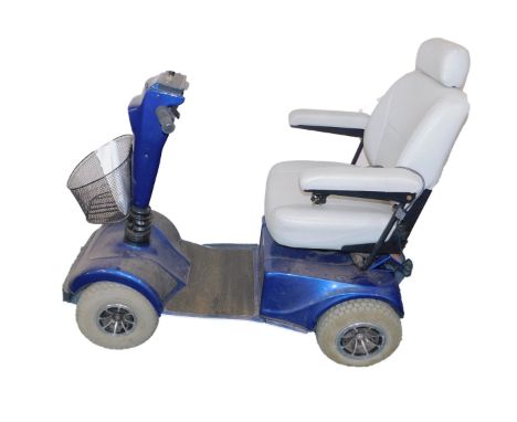 A Celebrity Pride XL blue mobility scooter.