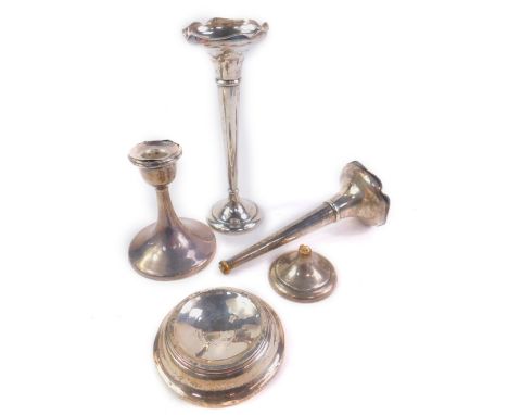 A pair of George V silver loaded bud vases, Birmingham 1918, loaded silver candlestick, Birmingham 1921, and a loaded silver 