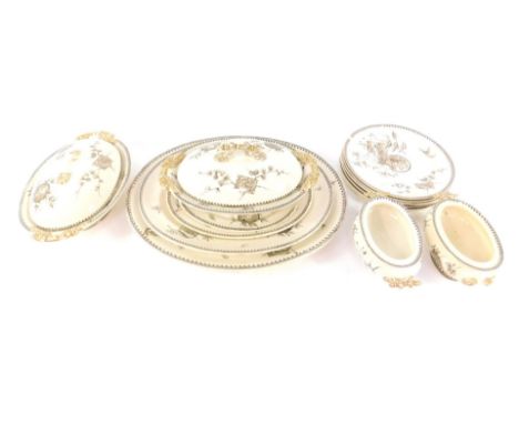 An Ashworth Pottery late 19thC part dinner service, transfer decorated in brown and white with vignettes of characters and sc
