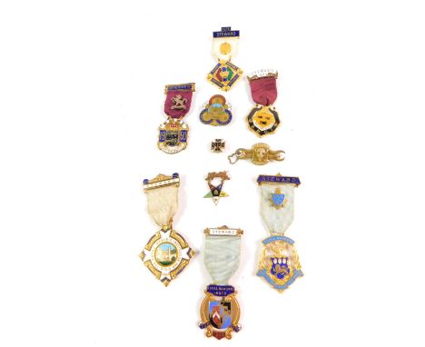 A 9ct gold and enamel Masonic badge, further 10ct gold and enamel badge, 6.0g, silver gilt RAOB brooch, further RAOB badge, a