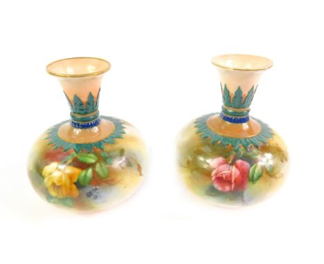 A pair of Hadleys Royal Worcester porcelain vases, c1907, of globular form painted with roses and other flowers, F110/103, pr