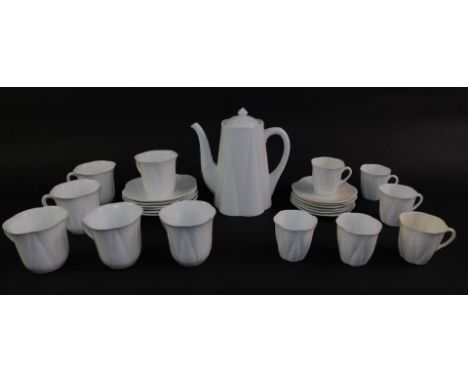 A Shelley white glazed porcelain part tea and coffee service, printed mark, comprising coffee pot, six tea cups and saucers, 