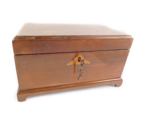 A late Georgian mahogany and inlaid tea caddy, of rectangular casket form, opening to reveal three recesses and two metal can