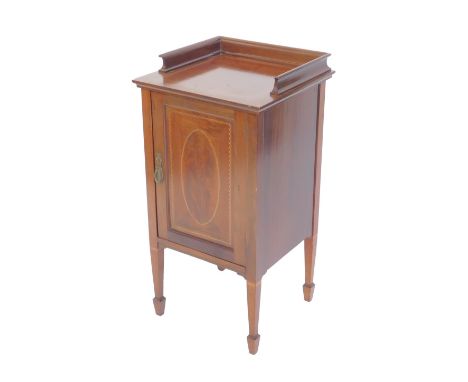 A late Victorian mahogany pot cupboard, with box wood and ebony stringing, for Goodalls, Furnishers and Decorators, Mancheste