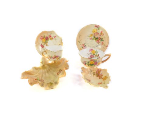 A group of Royal Worcester blush porcelain, late 19thC/early 20thC, decorated with flowers, comprising a scallop shell bowl, 