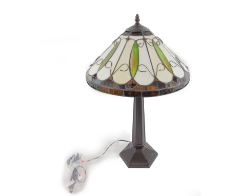 *A Minster Tiffany style table lamp, raised on a faux metal octagonal column and base, 41cm H.