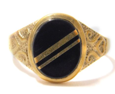 A 9ct gold and black onyx gentleman's signet ring, with two row gold banding with hammered scroll design shoulders on a plain