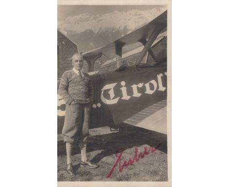 A large collection of postcards in two albums and loose, the majority topographical views from around the world, including a 
