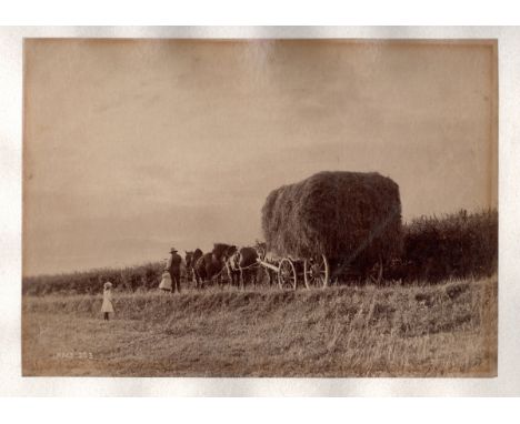 PHOTOGRAPHS. A mounted photograph of a haycart by Frank Meadow Sutcliffe, 15cm x 20.5cm, together with a group of other photo