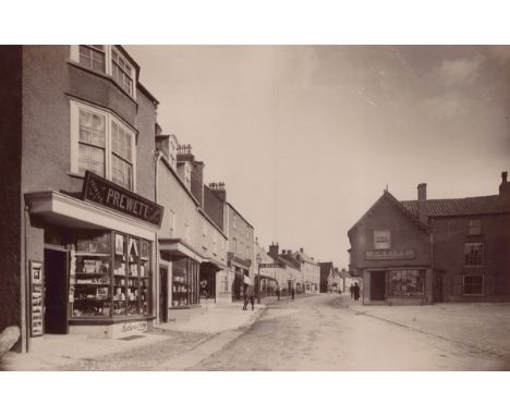 PHOTOGRAPHS. A collection of 36 brown-toned gelatin silver print photographs of Gloucestershire, predominantly Thornbury and 