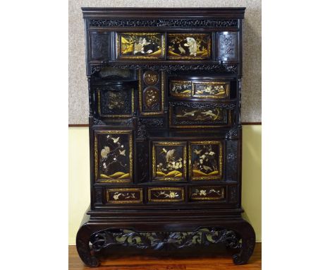 Well Done 20th Century Chinese Carved Hardwood Étagère on Base (Marriage). Set Throughout with Figural and Decorative Paneled