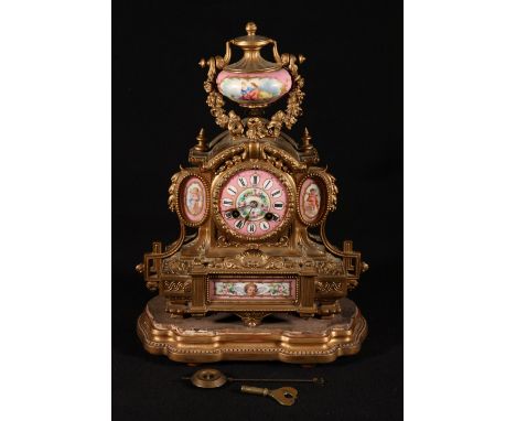Marti & Co., gilt spelter mantel clock set with painted porcelain panels and dial, 38cm tall