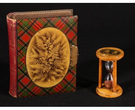 Mauchline tartan ware photograph album in Prince Charlie tartan 16cm and a Mauchline ware egg timer with Tam O Shanter decora