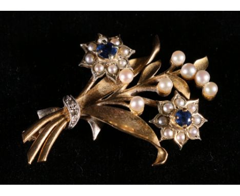 9ct gold sapphire and seed pearl brooch of floral spray form, makers stamp C & F CONDITION REPORT: Weight is approximately 7g