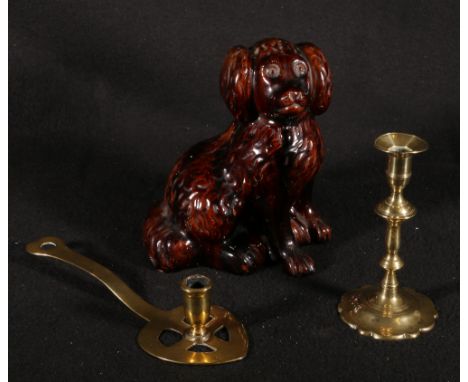 19th century Scottish pottery Spaniel with treacle glaze, brass candlestick and a Georgian brass chamberstick