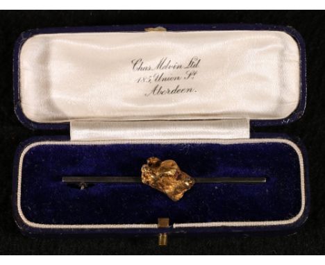 Silver bar brooch set with gold nugget, cased, 10.7g