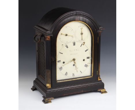 A Regency triple fusee bracket clock by James McCabe of London, the arched ebonised case with openwork 'fish scale' side pane