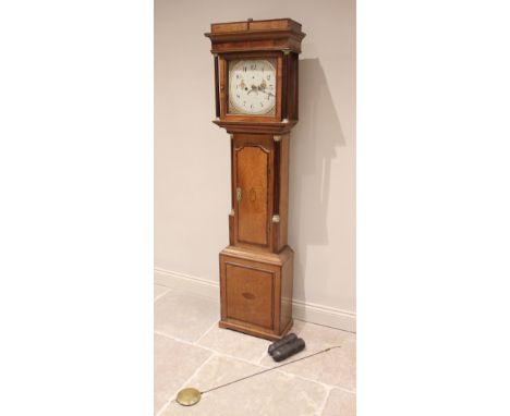 A George III oak and mahogany cross banded eight day longcase clock, the flat top hood with freestanding fluted columns flank