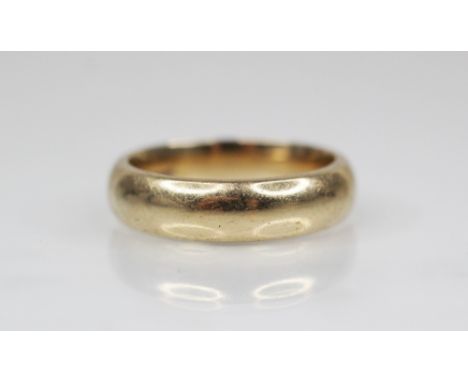 A 9ct gold wedding band, marks for 'CPM', Birmingham 1998, ring size S 1/2, weight 8.8gms 