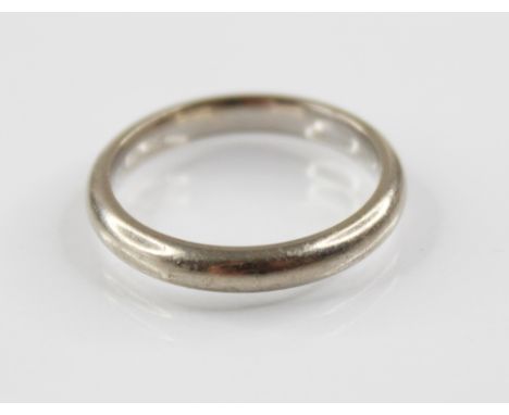 A Georg Jensen 18ct white gold band, plain polished, with Georg Jensen oval mark and stamped '750', ring size P 1/2, weight 6