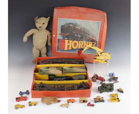 A boxed Hornby model train set 'Passenger set No. 31', along with an early 20th century plush teddy bear (worn), 37cm high, a